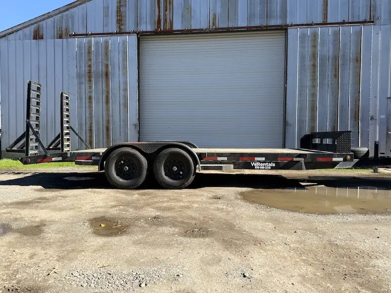 Flatbed trailer service — WI Rentals Stuttgart, Arkansas WI Rentals flatbed trailer prepared for hauling
